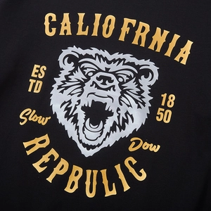 Black cotton hoodie featuring detailed gold foil lettering and silver bear head graphic