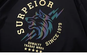 Macro shot of colorful wolf print on men's cotton tee with holographic lighting effects