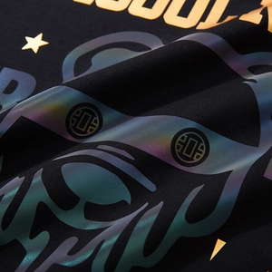 T-shirt en coton noir avec logo doré métallique et imprimé tigre aux reflets colorés