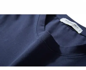 Detail view of navy blue cotton t-shirt neckline showing 3XL size label and stitching