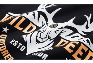 Macro view showing the high-quality wild deer print on a black cotton sweatshirt
