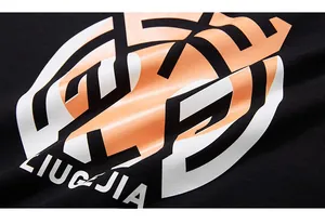 Detail of the high-quality rubberized tiger print and fabric texture on a black cotton tee