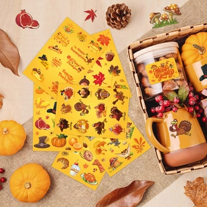 Detail view of Thanksgiving turkey and maple leaf stickers on glass jars and ceramic mugs