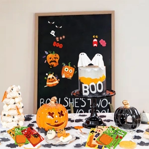 Halloween DIY pumpkin ghost and bat stickers for spooky party decoration on a chalkboard