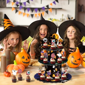 Three-tier Halloween cupcake stand with haunted house design and spooky party toppers