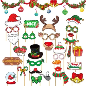 Detail of 30pcs Christmas photo booth props with Santa hats and reindeer antlers