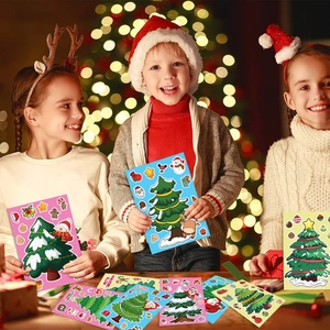 Children playing with colorful DIY Christmas tree stickers featuring Santa and Snowman