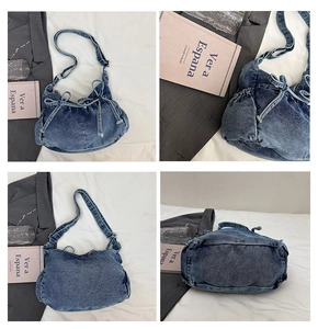 Detail view of washed denim bucket bag with side ribbon bows and adjustable shoulder strap