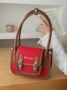 Red canvas and brown leather crossbody square bag with stylish double buckle closure