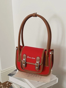 Vintage red canvas and brown leather crossbody bag with dual buckles and embroidery