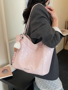 Pale pink faux leather tote bag with vintage texture and cute ice cream charm