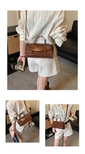 Detail shots of a brown glossy leather baguette bag with top handle and strap