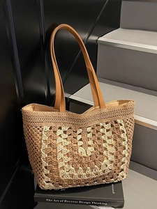 Retro woven straw tote bag with brown leather straps and geometric crochet pattern