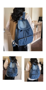 Détail d'un grand sac à dos en jean avec cordon de serrage et finition délavée