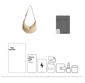 Capacity detail of beige crescent shoulder bag showing storage for phone and essentials