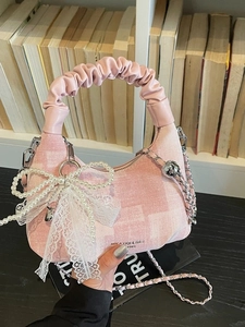 Chic pink checkered handbag with ruffled handle, pearl bow and elegant chain strap