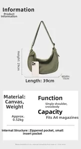 Detail of army green canvas crescent bag showing large capacity for A4 magazines