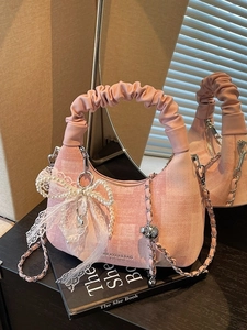 Pink plaid underarm bag with bow, pearl charms and elegant pleated handle design