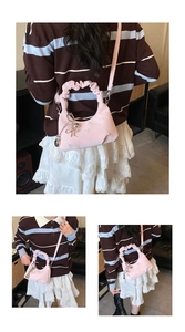 Detailed pink pleated handbag with star embroidery and metallic charms for women