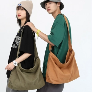 Large capacity washed canvas crossbody bag in olive green and tan for daily commuting