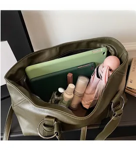 Top view of olive green faux leather tote showing spacious interior for daily essentials