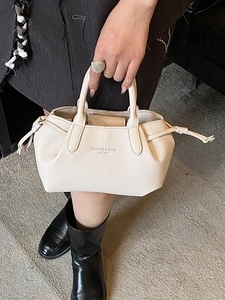 Sac fourre-tout élégant en cuir beige crème avec cordons et poignées pour femmes