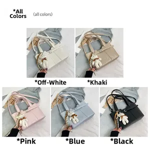 Detail of Korean bucket bag collection in five colors with cute bear charm accents