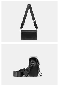 Detail of black matte crossbody bag with adjustable wide nylon strap and flap closure