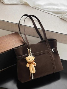 Retro dark brown tote bag in matte texture with cute teddy bear charm for women
