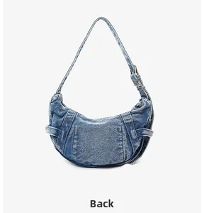 Vue arrière du sac demi-lune en jean avec bandoulière réglable et œillets métalliques