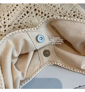 Detail view of woven bag featuring invisible magnetic metal buckle and fabric lining
