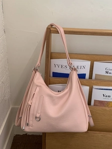 Pink vintage large capacity hobo bag with tassel and pebble leather texture for women