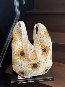 Handmade crochet sunflower tote bag made of cotton yarn for beach vacations