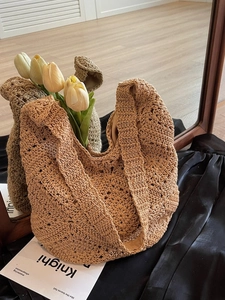 Handmade woven flower straw tote bag in camel and green for summer beach holidays