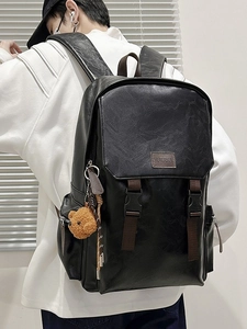 Fashionable black matte PU leather backpack with brown straps and plush bear pendant