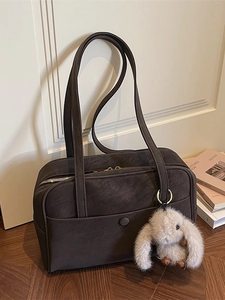 Vintage dark brown faux leather tote bag with plush rabbit charm and gold zipper detail