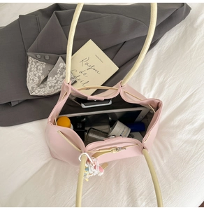 Spacious pink tote bag interior showing capacity for tablets and cosmetics