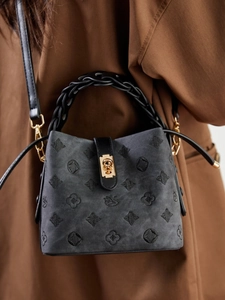 Chic dark gray denim bucket bag with embroidered patterns and swan buckle closure