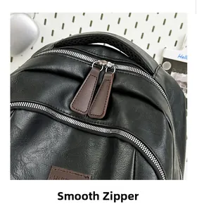 Macro detail of high-quality lychee texture PU leather with smooth dual metal zippers