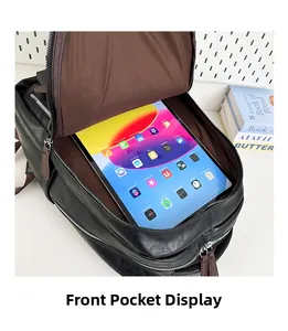 Detailed view of the front zipper pocket showing ample storage space for a tablet device
