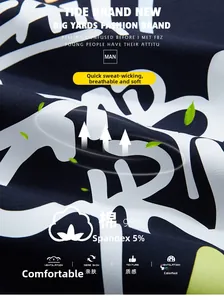 Detailed macro view of navy blue cotton blend fabric with large white graffiti letter prints