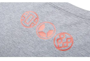 Detail of grey knitted cotton fabric featuring three orange circular graphic prints
