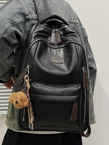 Large capacity black PU leather backpack with dual zippers and brown teddy bear charm