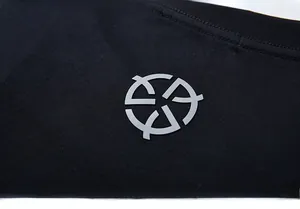Detail of high-quality cotton T-shirt ribbed neckline with printed minimalist logo