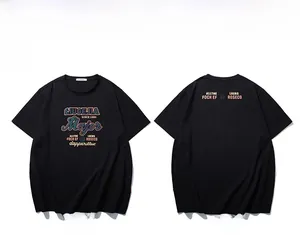 Macro detail of black cotton T-shirt featuring vintage letter print on front and back
