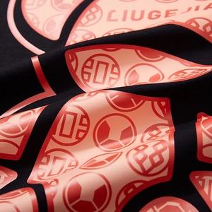 Macro detail of bear letter print on black cotton oversized T-shirt with pink logo