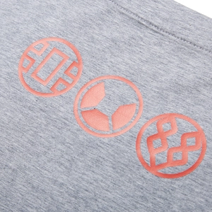 Macro shot of grey cotton knit T-shirt with three orange geometric circular prints