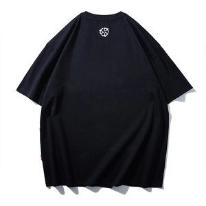 Loose fit black cotton heavy weight t-shirt with minimalist white graphic print on back