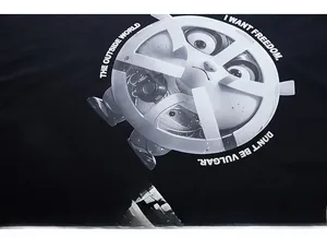 Detail of mechanical cartoon print and slogan on heavy cotton streetwear t-shirt