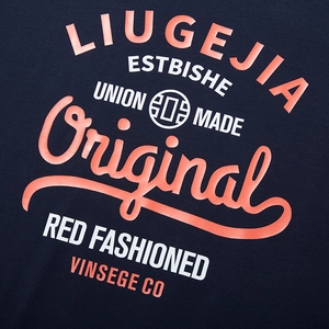 Front view of deep blue cotton T-shirt featuring orange and white retro letter prints